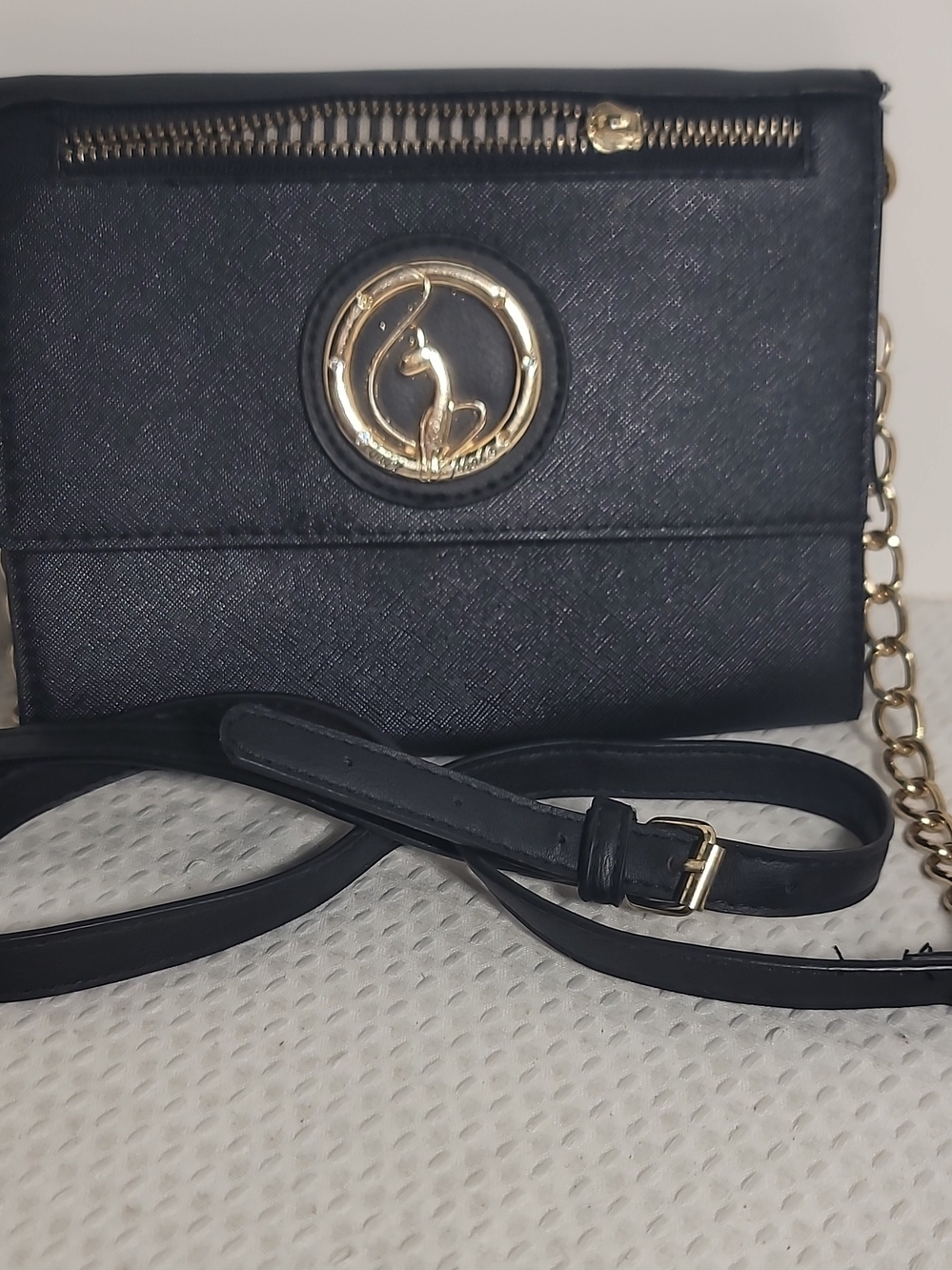 Black Crossbody Bag with Gold Emblem